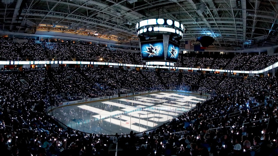 SAP Center at San Jose, a packed arena under a light show. A venue photograph, not a portrait, and no player is identified in it.
